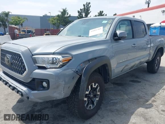 ✅ 2019 Toyota Tacoma SR5 • VIN: 3TMDZ5BNXKM057710 • Lot: 42061769. Wystawiony na IAAI z przebiegiem 82 575 mil. Bezpłatny archiwum sprzedaży aukcyjnych z USA i szczegółowy raport historii pojazdu na DreamBid. Zdjęcie 19.