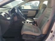 ✅ 2017 Honda CR-V LX • VIN: 2HKRW5H34HH401681 • Lot: 91076015. Wystawiony na Copart z przebiegiem 50 283 mil. Bezpłatny archiwum sprzedaży aukcyjnych z USA i szczegółowy raport historii pojazdu na DreamBid. Zdjęcie 7.