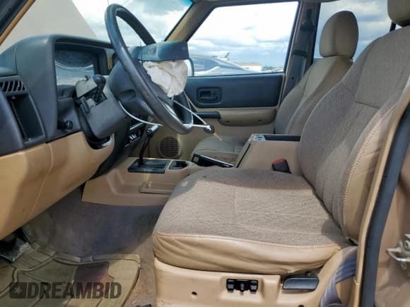 ✅ 1999 Jeep Cherokee Sport • VIN: 1J4FT68S8XL505703 • Lot: 68164535. Listed on Copart with 195,074 mi. Free auction sales archive from the USA and detailed vehicle history report at DreamBid. Image 7.