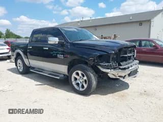 ✅ 2015 Ram 1500 Laramie • VIN: 1C6RR7NM1FS573124 • Lot: 43003835. Listed on IAAI with 109,689 mi. Free auction sales archive from the USA and detailed vehicle history report at DreamBid. Image 1.