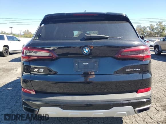 ✅ 2023 BMW X5 xDrive45e • VIN: 5UXTA6C03P9N92460 • Лот: 87025515. Опубликован ранее на Copart с пробегом 65 068 миль. Бесплатный доступ к архиву аукционных продаж из США и подробный отчёт об истории автомобиля на DreamBid. Изображение 6.