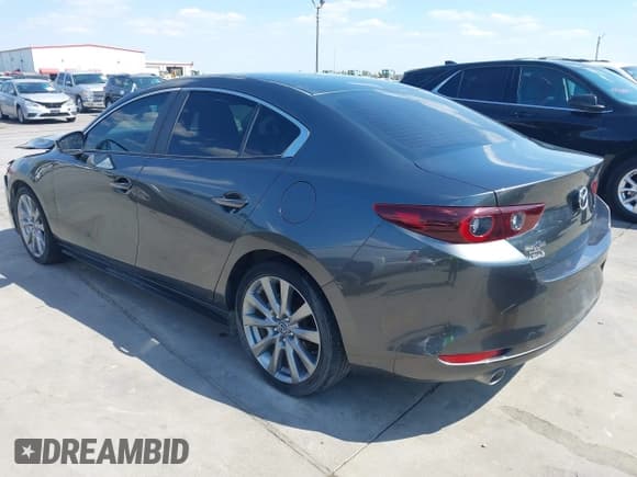 ✅ 2023 Mazda 3 S Carbon Edition • VIN: 3MZBPACM9PM377388 • Lot: 43347186. Listed on IAAI with 32,175 mi. Free auction sales archive from the USA and detailed vehicle history report at DreamBid. Image 3.