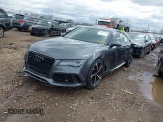 ✅ 2015 Audi RS 7 Prestige • VIN: WUAW2AFC7FN900677 • Лот: 42016755. Опубликован ранее на IAAI с пробегом 51 524 миль. Бесплатный доступ к архиву аукционных продаж из США и подробный отчёт об истории автомобиля на DreamBid. Изображение 2.