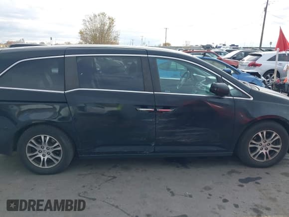 ✅ 2013 Honda Odyssey EX • VIN: 5FNRL5H44DB075407 • Lot: 43725774. Listed on IAAI with 192,101 mi. Free auction sales archive from the USA and detailed vehicle history report at DreamBid. Image 13.