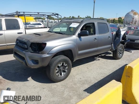✅ 2006 Toyota Tacoma PreRunner • VIN: 5TEKU72N06Z222433 • Lot: 43106523. Listed on IAAI with 214,707 mi. Free auction sales archive from the USA and detailed vehicle history report at DreamBid. Image 2.