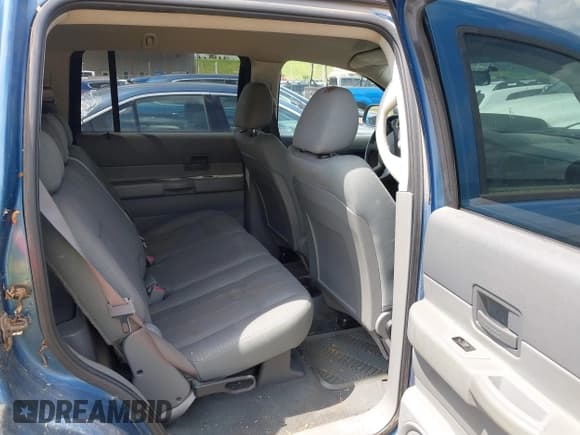 ✅ 2005 Dodge Durango SXT • VIN: 1D4HB38N95F575185 • Лот: 42680439. Опубликован ранее на IAAI с пробегом 201 781 миль. Бесплатный доступ к архиву аукционных продаж из США и подробный отчёт об истории автомобиля на DreamBid. Изображение 8.