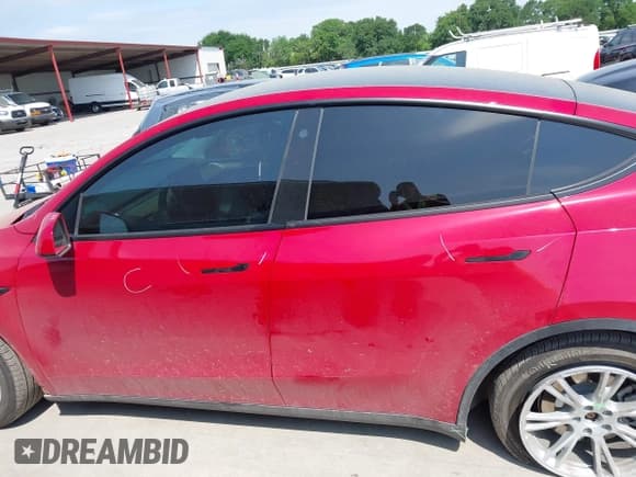 ✅ 2023 Tesla Model Y Long Range • VIN: 7SAYGAEE7PF691499 • Lot: 42038850. Listed on IAAI with 26,439 mi. Free auction sales archive from the USA and detailed vehicle history report at DreamBid. Image 15.