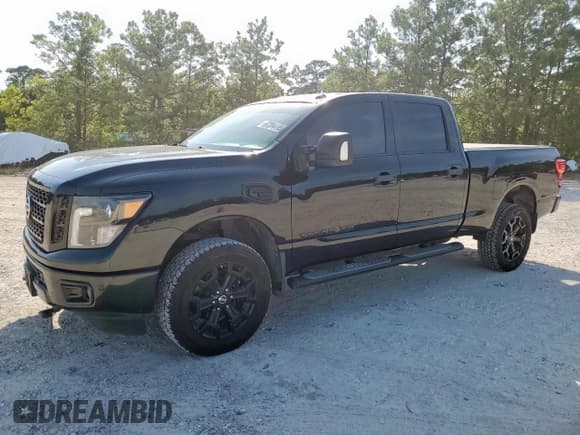 ✅ 2018 Nissan Titan Platinum Reserve • VIN: 1N6BA1F43JN525223 • Lot: 67204495. Listed on Copart with 112,352 mi. Free auction sales archive from the USA and detailed vehicle history report at DreamBid. Image 1.