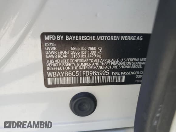 ✅ 2015 BMW 7 Series 750i xDrive • VIN: WBAYB6C51FD965925 • Lot: 64252505. Listed on Copart with 123,038 mi. Free auction sales archive from the USA and detailed vehicle history report at DreamBid. Image 13.