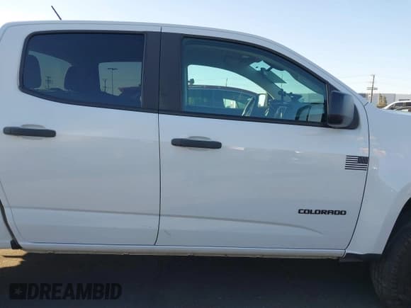 ✅ 2019 Chevrolet Colorado 2WD Work Truck • VIN: 1GCGSBEA1K1115077 • Lot: 41653601. Wystawiony na IAAI z przebiegiem 92 537 mil. Bezpłatny archiwum sprzedaży aukcyjnych z USA i szczegółowy raport historii pojazdu na DreamBid. Zdjęcie 13.