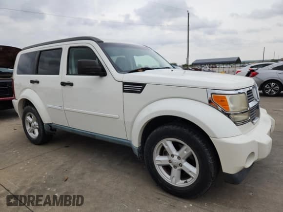 ✅ 2007 Dodge Nitro SLT • VIN: 1D8GT58K57W718953 • Lot: 90119395. Wystawiony na Copart z przebiegiem 163 241 mil. Bezpłatny archiwum sprzedaży aukcyjnych z USA i szczegółowy raport historii pojazdu na DreamBid. Zdjęcie 4.