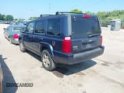 ✅ 2009 Jeep Commander Sport • VIN: 1J8HG48K09C501891 • Lot: 42668886. Listed on IAAI with 163,102 mi. Free auction sales archive from the USA and detailed vehicle history report at DreamBid. Image 3.