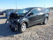 ✅ 2014 Ford Escape SE • VIN: 1FMCU0GX0EUC18293 • Lot: 43680780. Listed on IAAI with 96,880 mi. Free auction sales archive from the USA and detailed vehicle history report at DreamBid. Image 18.