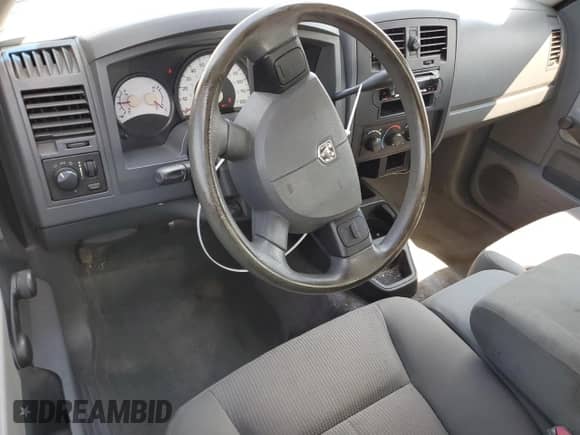 2005 Dodge Dakota ST с VIN 1D7HE22K55S217673, выставлен на аукционе Copart как лот 75668744 с пробегом 142 379 миль миль и Списание • Salvage title. История ставок и продаж доступна на DreamBid. Изображение 8.