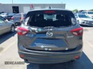 ✅ 2016 Mazda CX-5 Grand Touring • VIN: JM3KE4DY3G0912088 • Lot: 42203530. Wystawiony na IAAI z przebiegiem 86 914 mil. Bezpłatny archiwum sprzedaży aukcyjnych z USA i szczegółowy raport historii pojazdu na DreamBid. Zdjęcie 16.