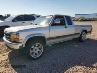 1991 Dodge Dakota z VIN 1B7GL23Y3MS309507, wystawiony jako Copart lot #58079905 z przebiegiem 90 932 mil mil oraz Szkoda całkowita • Salvage title. Historia ofert i sprzedaży dostępna na DreamBid. Obrazek 1.