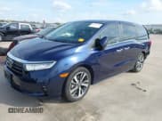 ✅ 2023 Honda Odyssey Touring • VIN: 5FNRL6H88PB052824 • Lot: 43543495. Listed on IAAI with 30,069 mi. Free auction sales archive from the USA and detailed vehicle history report at DreamBid. Image 18.