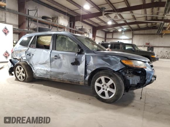 ✅ 2009 Hyundai Santa Fe SE • VIN: 5NMSH13E09H234800 • Lot: 68507634. Listed on Copart with 125,063 mi. Free auction sales archive from the USA and detailed vehicle history report at DreamBid. Image 4.