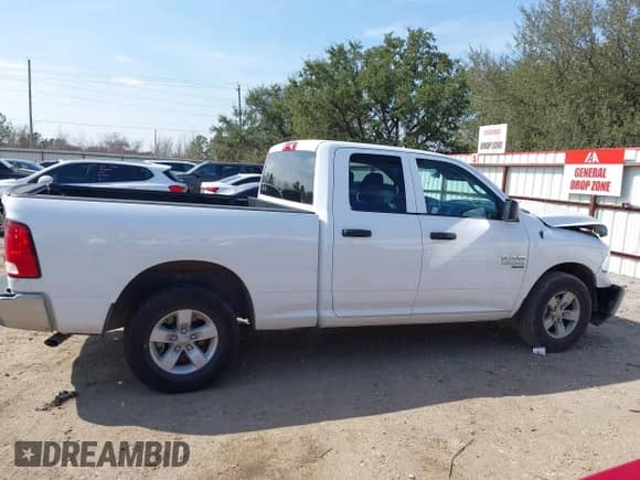2024 Ram 1500 SLT with VIN 1C6RR6GG3RS128728, listed as a IAAI auction lot 41598041 with 24,872 mi miles and . Bid and sale history available at DreamBid. Image 14.