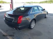 ✅ 2014 Cadillac CTS Luxury AWD • VIN: 1G6AX5SX7E0159728 • Lot: 43073163. Listed on IAAI with 153,349 mi. Free auction sales archive from the USA and detailed vehicle history report at DreamBid. Image 4.