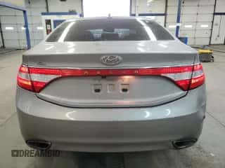 2013 Hyundai Azera z VIN KMHFG4JG4DA223310, wystawiony jako Copart lot #81318854 z przebiegiem 133 312 mil mil oraz Szkoda całkowita • Salvage title. Historia ofert i sprzedaży dostępna na DreamBid. Obrazek 6.