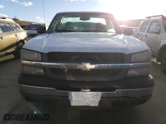 ✅ 2003 Chevrolet Silverado 1500 • VIN: IDCO004199ZZ • Лот: 85870734. Опубликован ранее на Copart с пробегом 289 533 миль. Бесплатный доступ к архиву аукционных продаж из США и подробный отчёт об истории автомобиля на DreamBid. Изображение 5.