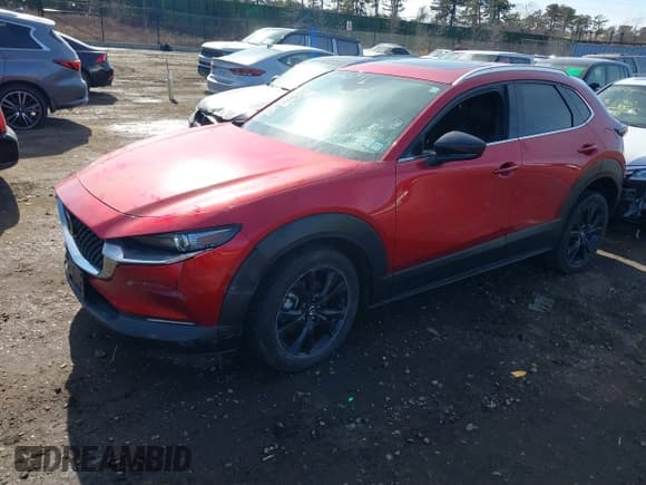 ✅ 2022 Mazda CX-30 Premium • VIN: 3MVDMBDY1NM458943 • Лот: 41513141. Опубликован ранее на IAAI с пробегом 16 858 миль. Бесплатный доступ к архиву аукционных продаж из США и подробный отчёт об истории автомобиля на DreamBid. Изображение 2.