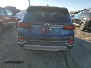 ✅ 2020 Hyundai Santa Fe SE • VIN: 5NMS2CAD8LH145507 • Lot: 82292873. Wystawiony na Copart z przebiegiem 29 788 mil. Bezpłatny archiwum sprzedaży aukcyjnych z USA i szczegółowy raport historii pojazdu na DreamBid. Zdjęcie 6.