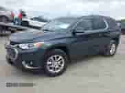 2019 Chevrolet Traverse LT Cloth z VIN 1GNEVMKW7KJ238111, wystawiony jako IAAI lot #43282872 z przebiegiem 122 571 mil mil oraz . Historia ofert i sprzedaży dostępna na DreamBid. Obrazek 18.