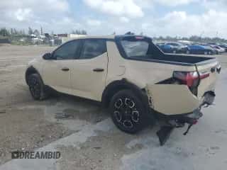 2022 Hyundai Santa Cruz SEL с VIN 5NTJBDAE6NH001794, выставлен на аукционе Copart как лот 79401464 с пробегом 59 515 миль миль и На запчасти • Non repairable. История ставок и продаж доступна на DreamBid. Изображение 2.