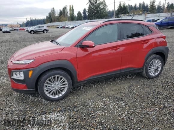 ✅ 2021 Hyundai Kona SEL • VIN: KM8K2CAA8MU628054 • Лот: 74726703. Опубликован ранее на Copart с пробегом 21 495 миль. Бесплатный доступ к архиву аукционных продаж из США и подробный отчёт об истории автомобиля на DreamBid. Изображение 1.