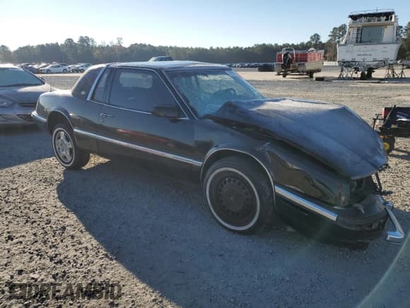 ✅ 1990 Buick Riviera • VIN: 1G4EZ13C0LU417859 • Lot: 82902894. Listed on Copart with 245,026 mi. Free auction sales archive from the USA and detailed vehicle history report at DreamBid. Image 4.