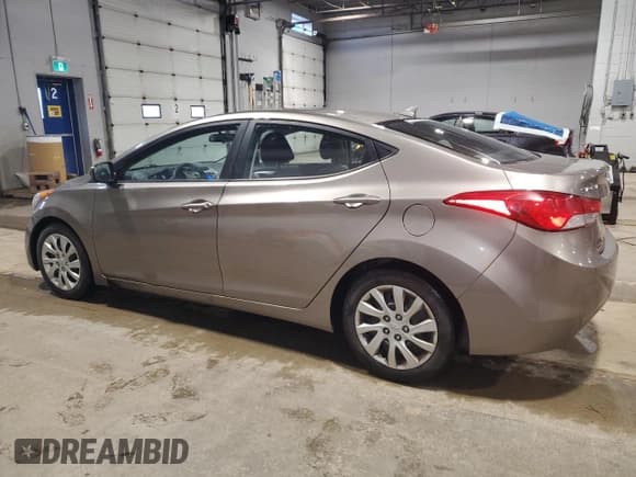 ✅ 2013 Hyundai Elantra Limited • VIN: 5NPDH4AE8DH332840 • Lot: 90817075. Listed on Copart with 146,221 mi. Free auction sales archive from the USA and detailed vehicle history report at DreamBid. Image 2.