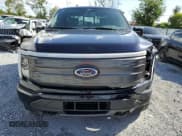 ✅ 2023 Ford F-150 Lightning Lariat • VIN: 1FTVW1EL7PWG20719 • Lot: 85266825. Listed on Copart with 66,237 mi. Free auction sales archive from the USA and detailed vehicle history report at DreamBid. Image 5.