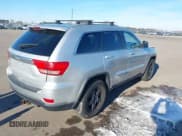 ✅ 2011 Jeep Grand Cherokee Laredo • VIN: 1J4RR4GG6BC589400 • Lot: 43798652. Listed on IAAI with 212,945 mi. Free auction sales archive from the USA and detailed vehicle history report at DreamBid. Image 4.