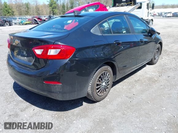 ✅ 2016 Chevrolet Cruze LS • VIN: 1G1BB5SM6G7284535 • Lot: 42157063. Listed on IAAI with 80,852 mi. Free auction sales archive from the USA and detailed vehicle history report at DreamBid. Image 4.