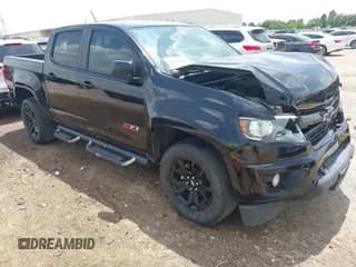 2018 Chevrolet Colorado 2WD Z71 z VIN 1GCGSDEN2J1157965, wystawiony jako IAAI lot #42656546 z przebiegiem 144 958 mil mil oraz . Historia ofert i sprzedaży dostępna na DreamBid. Obrazek 1.