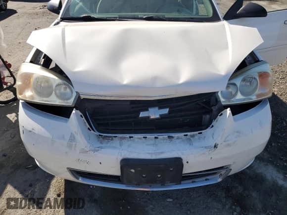 2007 Chevrolet Malibu LS z VIN 1G1ZS58N57F301779, wystawiony jako Copart lot #84283665 z przebiegiem 99 219 mil mil oraz Szkoda całkowita • Salvage title. Historia ofert i sprzedaży dostępna na DreamBid. Obrazek 11.