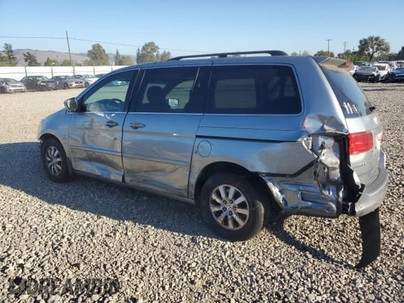 ✅ 2009 Honda Odyssey EX-L • VIN: 5FNRL38609B022992 • Lot: 90474065. Listed on Copart with 106,975 mi. Free auction sales archive from the USA and detailed vehicle history report at DreamBid. Image 2.