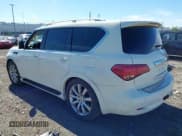 ✅ 2014 Infiniti QX80 • VIN: JN8AZ2NE9E9064040 • Lot: 43014644. Listed on IAAI with 141,766 mi. Free auction sales archive from the USA and detailed vehicle history report at DreamBid. Image 3.