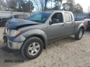 ✅ 2009 Nissan Frontier SE • VIN: 1N6AD09W69C423948 • Lot: 50600545. Listed on Copart with 221,181 mi. Free auction sales archive from the USA and detailed vehicle history report at DreamBid. Image 1.