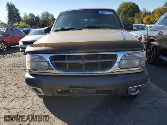 1999 Ford Explorer XLT with VIN 1FMZU34E0XZB84358, listed as a Copart auction lot 82398575 with 166,440 mi miles and Salvage title. Bid and sale history available at DreamBid. Image 5.