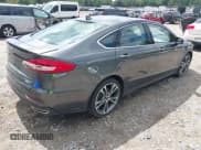✅ 2020 Ford Fusion Titanium • VIN: 3FA6P0D97LR116854 • Lot: 43081513. Listed on IAAI with 97,625 mi. Free auction sales archive from the USA and detailed vehicle history report at DreamBid. Image 4.