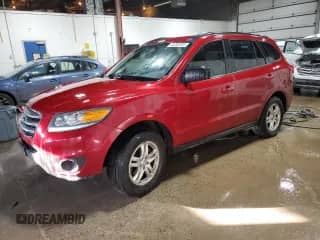 2012 Hyundai Santa Fe GLS with VIN 5XYZGDAG7CG117529, listed as a Copart auction lot 43200205 with 216,723 mi miles and Non repairable. Bid and sale history available at DreamBid. Image 1.