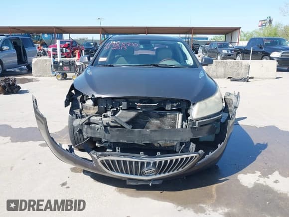 ✅ 2013 Buick LaCrosse Premium 2 • VIN: 1G4GH5E3XDF137436 • Lot: 41988900. Wystawiony na IAAI z przebiegiem 338 221 mil. Bezpłatny archiwum sprzedaży aukcyjnych z USA i szczegółowy raport historii pojazdu na DreamBid. Zdjęcie 13.