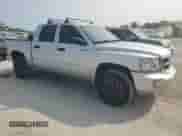 2010 Dodge Dakota ST z VIN 1D7CW2GK8AS143546, wystawiony jako Copart lot #71019664 z przebiegiem 116 705 mil mil oraz Szkoda całkowita • Salvage title. Historia ofert i sprzedaży dostępna na DreamBid. Obrazek 4.