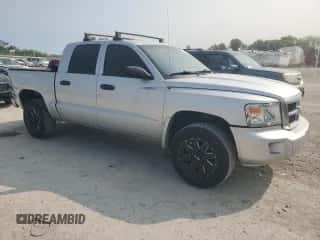 2010 Dodge Dakota ST z VIN 1D7CW2GK8AS143546, wystawiony jako Copart lot #71019664 z przebiegiem 116 705 mil mil oraz Szkoda całkowita • Salvage title. Historia ofert i sprzedaży dostępna na DreamBid. Obrazek 4.