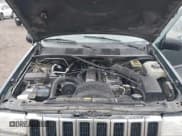 ✅ 1994 Jeep Grand Cherokee Laredo • VIN: 1J4GZ58S0RC216914 • Lot: 43577799. Listed on IAAI with 334,197 mi. Free auction sales archive from the USA and detailed vehicle history report at DreamBid. Image 10.