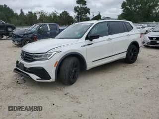 ✅ 2023 Volkswagen Tiguan SE R-Line Black • VIN: 3VVCB7AX9PM111182 • Лот: 85003455. Опубликован ранее на Copart с пробегом 41 036 миль. Бесплатный доступ к архиву аукционных продаж из США и подробный отчёт об истории автомобиля на DreamBid. Изображение 1.