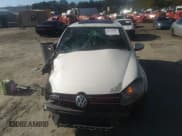 ✅ 2012 Volkswagen Golf GTI w/Conv & Sunroof • VIN: WVWEV7AJ5CW094384 • Lot: 41744860. Listed on IAAI with 157,285 mi. Free auction sales archive from the USA and detailed vehicle history report at DreamBid. Image 13.